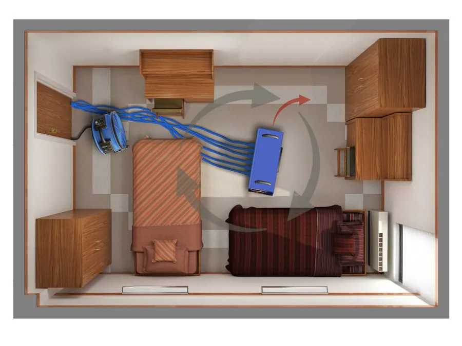Top view of a bedroom with a heater and fan: arrows show hot air circling the room